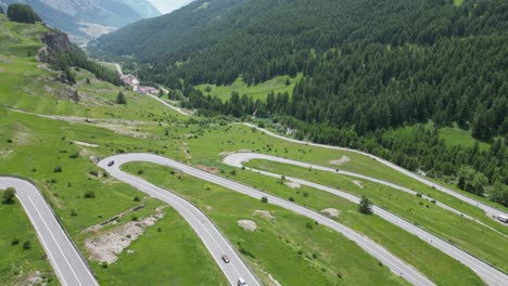Cars-drive-Mountain-Pass-Maddalena-in-Alps-between-France-and-Italy---Aerial-4k-High-Angle