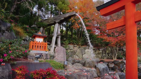 Katsuoji-Temple-in-Minoh-Osaka,-Slow-motion-Waterfall-and-Torii-Gate-in-Autumn