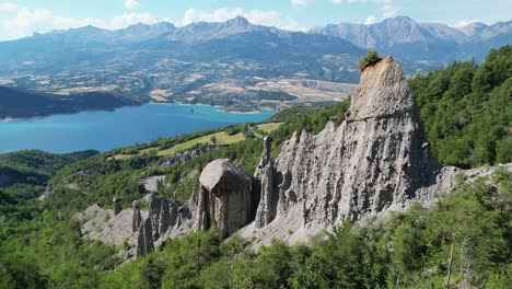 Rock-Formation-and-Nature-Landscape-at-Lake-Serre-Poncon,-French-Alps,-France---Aerial-4k-Circling