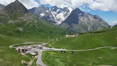 Col-du-Lautaret-Mountain-Pass-and-La-Meije-Peaks-in-French-Alps,-France---Aerial-4k