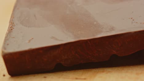 Macro-Dolly-of-broken-piece-of-chocolate-tablet