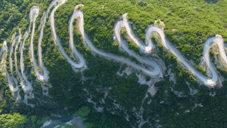 Aerial-view-of-the-provincial-road-with-many-zigzag-in-the-Epirus-Zagorohoria,-Greece