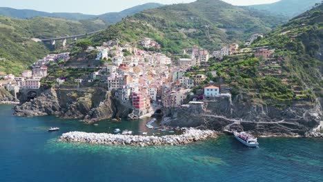 Cinque-Terre-Riomaggiore-Village-in-Vernazza,-La-Spezia,-Liguria,-Italy---Aerial-4k-Circling
