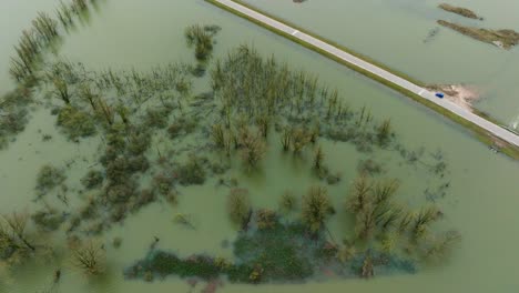 Drone-shot-of-underwater-road-in-the-floods-of-Netherlands