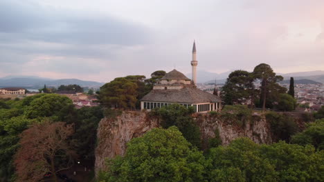 Evening-orbit-aerial-footage-of-Fethiye-Mosque-and-Ali-Pasha-Tomb-in-Ioannina-Castle,-Epirus,-Greece