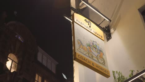 Detail-of-Pub-sign-Shepherd-neame-during-night-time,-London,-England