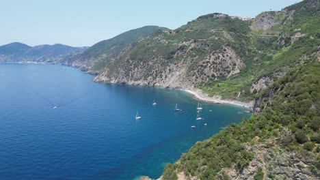 Boats-and-Scenic-Coastline-of-Cinque-Terre-and-Ligurian-Sea-in-Italy---Aerial-4k