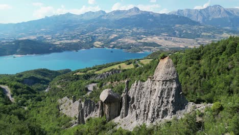 Rock-Formation-and-Nature-Landscape-at-Lake-Serre-Poncon,-French-Alps,-France---Aerial-4k