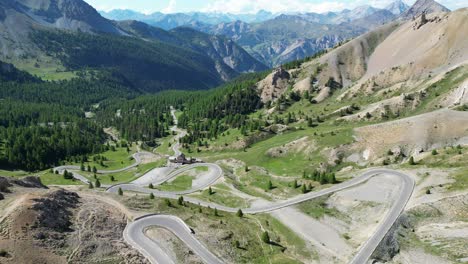 Scenic-Road-with-Hairpin-turns-at-Col-Izoard-Mountain-Pass-in-French-Alps,-France---Aerial-4k