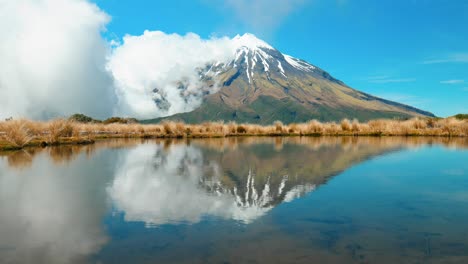 Mirror-of-nature:-Mount-Taranaki-with-water-reflection-in-captivating-stock-footage