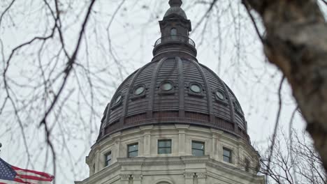 Kansas-state-capitol-building-in-Topeka,-Kansas-with-close-up-video-tilting-down-from-dome