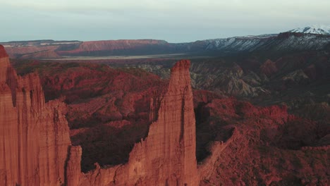 A-high-flying-drone-shot-over-the-grand-Fisher-Towers,-near-MOAB,-Utah