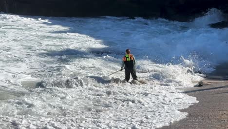 4K-footage-of-workers-collecting-water-sample-at-La-Jolla-Cove-in-San-Diego-California