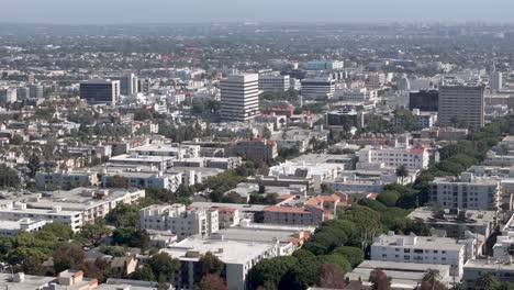 Aerial-Rising-Shot-View-Of-Santa-Monica-Cityscape-With-Variety-of-Large-And-Small-Buildings