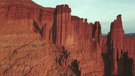 A-high-flying-drone-shot-over-the-grand-Fisher-Towers-in-Utah
