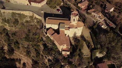 Drone-orbiting-around-church-of-Santa-María-in-San-Martin-Sarroca,-Catalonia