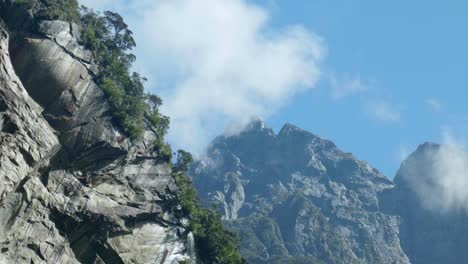 ajestic-heights:-Mountain-above-cliff-at-Milford-Sound-in-captivating-stock-footage