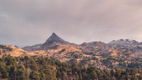 Close-up-Timelapse-of-Pic-d-Anie-mountain-in-Spain-France-border-under-cloudy-dramatic-sky-in-a-fall-autumn-day
