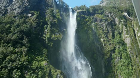 Nature's-cascade:-Moving-down-waterfall-at-Milford-Sound-in-captivating-stock-footage