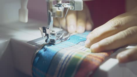 Sewing-machine-stitches-fabric-with-precision-as-needle-moves-with-speed