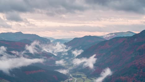 Close-up-detail-shot-of-Roncal-valley-in-Spain-pyrenees-during-misty-low-clouds-and-high-clouds-cloudy-sunrise-beautiful-valley-during-fall-autumn-season-timelapse