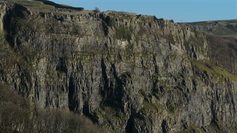 Closeup-Drone-Shot-of-Steep-Rocky-Cliff-Face-near-Stainforth-Yorkshire