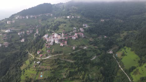 Drone-view-of-the-village-built-on-the-slope-of-the-mountain,-the-famous-plateaus-of-the-Black-Sea