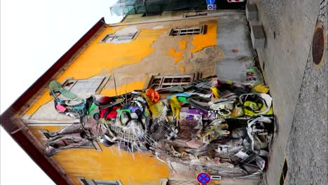 O-Coelho-street-art-made-with-recycled-materials-in-Porto,-Portugal