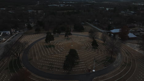 High-aerial-view-of-Fayetteville-white-graves-in-circle-around-American-Flag-pole