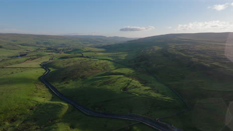 Establishing-Drone-Shot-of-Yorkshire-Dales-Hilly-Rural-Landscape-UK