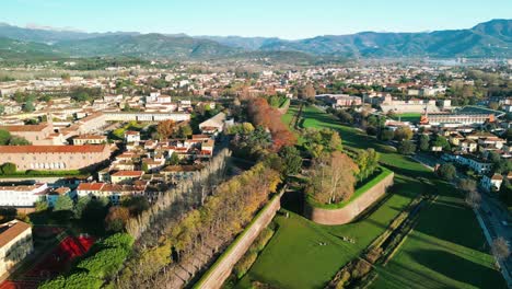 Birds-eye-view-of-Lucca-city-in-Tuscany,-Italy-known-for-Lucca-walls