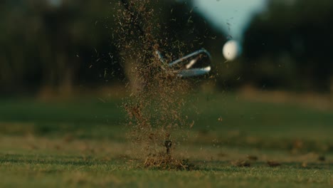 Slow-motion-golf-shot-from-behind,-wedge-shot-from-tee-on-par-3,-perfect-ball-flight-on-sunny-day