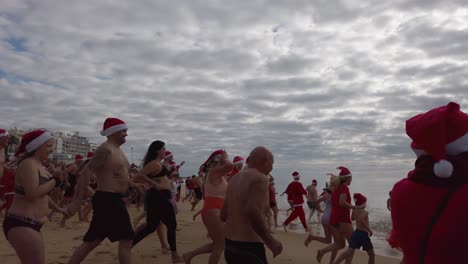 The-start-of-the-traditional-Santa-Swim-in-December-on-the-beach