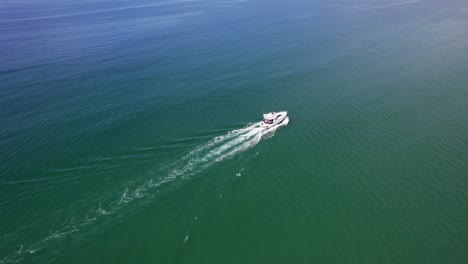 Luxury-Fishing-Trawler-Sailing-off-the-Cornish-Coastal-Waters-on-a-Summers-Day,-Aerial-Drone-Shot