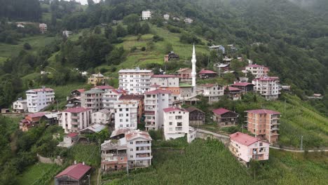 Drone-view-of-the-mosque-minaret-in-the-town-built-at-the-foot-of-the-mountain