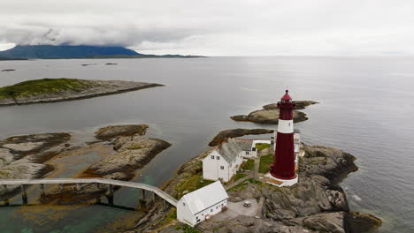 Aerial-View-Of-Tranoy-Lighthouse-And-Calm-Waters-Of-Norwegian-Sea-In-Hamaroy,-Nordland,-Norway