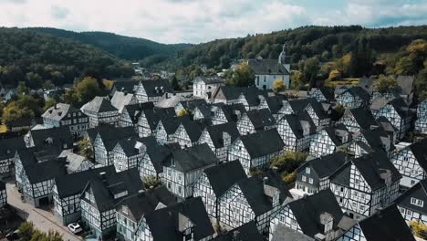 A-dolly-in-drone-shot-of-the-cottage-houses-in-Freudenberg