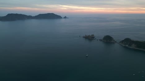Panoramic-Zoom-Out-Blue-Ocean-in-Mexico-Jalisco-Sunset-Drone,-Barra-de-Navidad