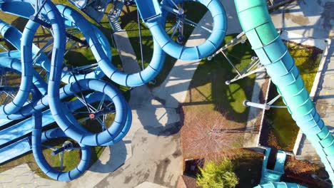 Slowly-Rising-Above-Deserted-Serpentine-Slides-at-Waterpark