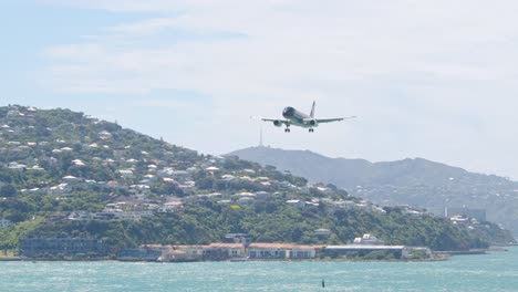 A-black-Air-New-Zealand-Airbus-A320-plane-landing-at-Wellington-airport,-New-Zealand