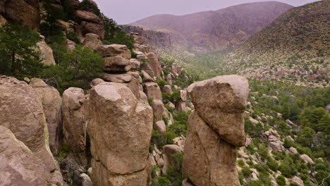 Drone-footage-flying-close-to-rock-face-in-Chiricahua-National-Monument-near-sunrise