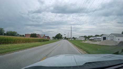 POV---Driving-into-a-small-Midwest-town-on-a-cloudy-day-in-late-summer