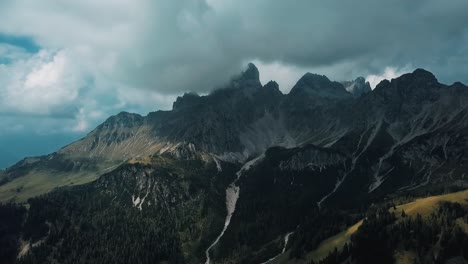 A-slow-drone-shot-of-storm-clouds-rolling-over-the-Alps