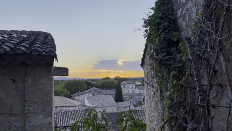 View-of-a-French-village-between-two-stone-houses-on-the-same-level-with-beautiful-historic-houses-in-the-village
