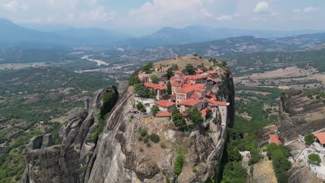 Meteora-Monastery-in-Greece-Mainland---Popular-Tourist-Attraction-and-Unesco-World-Heritage-Site---Aerial-4k-Circling