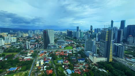 Vista-De-La-Ciudad,-Tiempo-Transcurrido,-Rascacielos-De-Cristal,-Torres-Gemelas-Petronas,-Kuala-Lumpur-Malasia