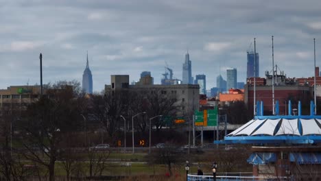 An-aerial-view-of-the-east-side-of-New-York-City-from-over-Flushing-Meadows-Corona-Park-in-Queens-on-a-cloudy-day