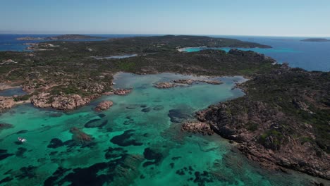 aerial-panoramic-view-of-sea-of-Sardinia-with-turquoise-sea-and-rocky-coastal-lines-and-untouched-nature