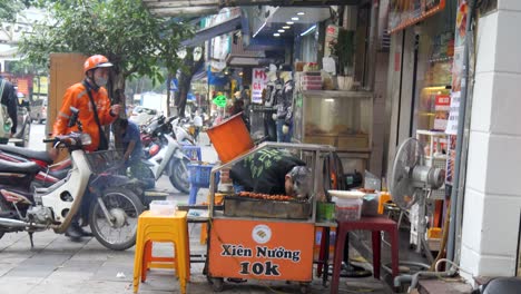 Street-vendor-in-the-city-prepares-delicious-chicken-skewers-for-sale