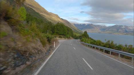 Otago,-New-Zealand---Traveling-on-a-Road-Alongside-Lake-Wakatipu-Towards-Glenorchy---POV